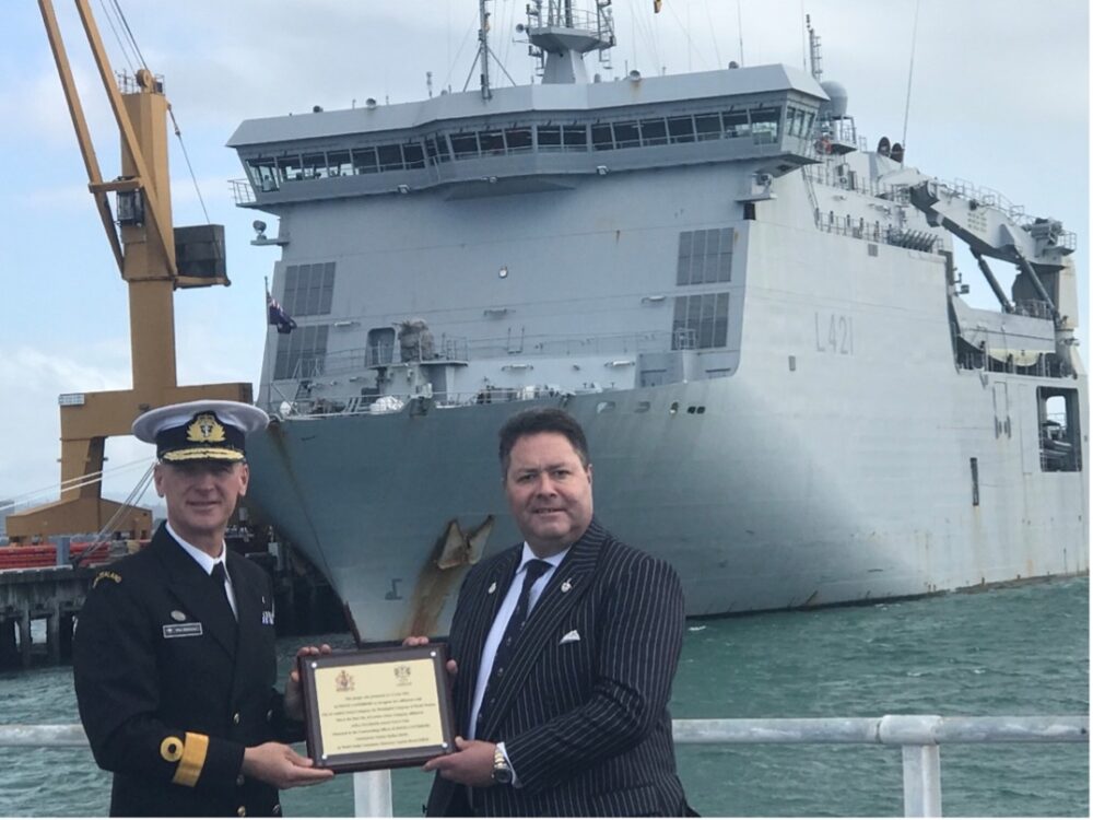 First presentation of plaque on land